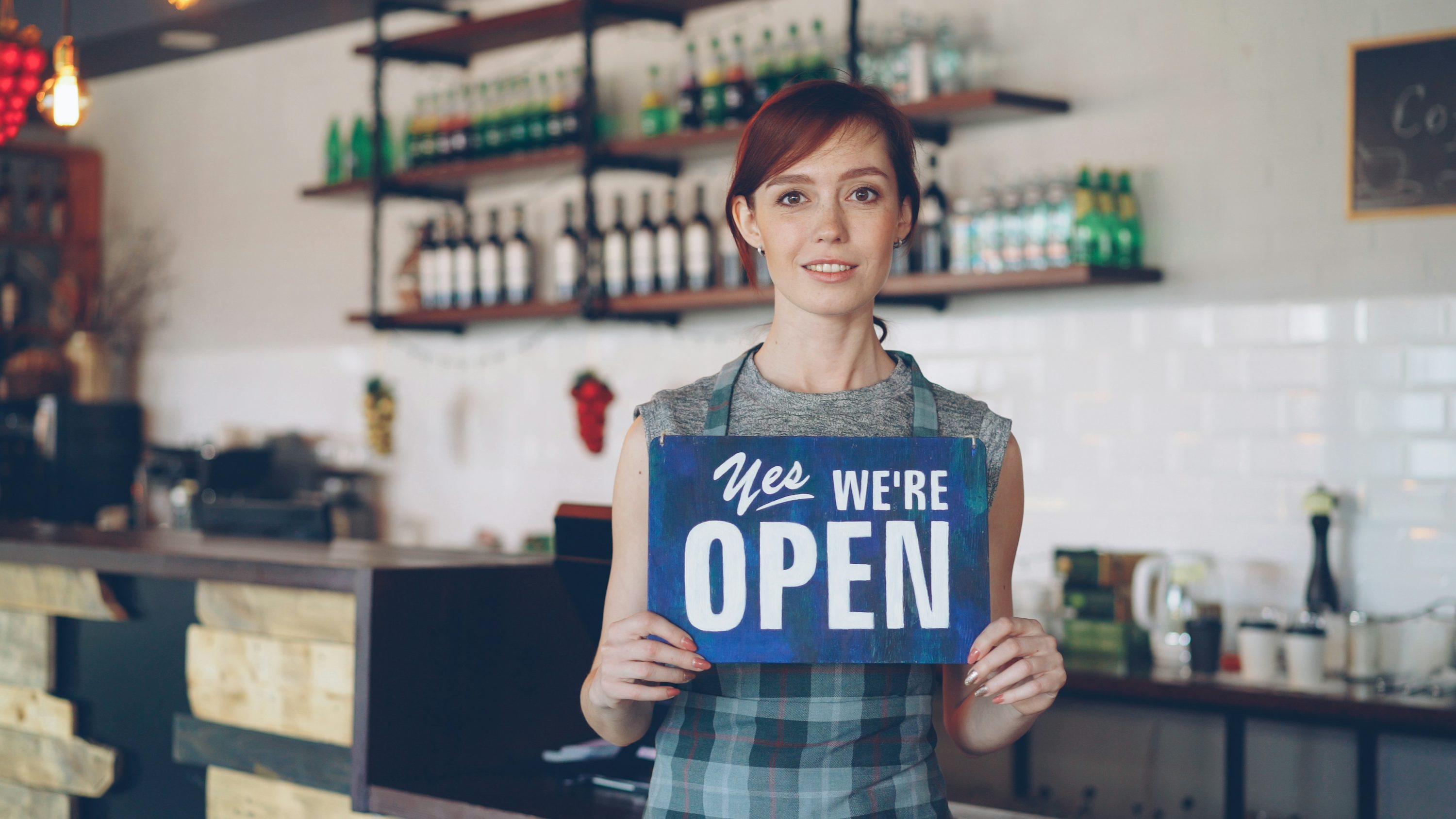A business owner checking information at the start of the day