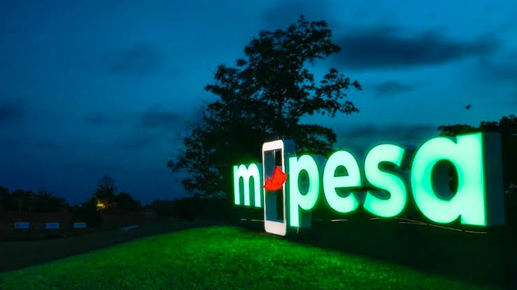 M-Pesa payment workflow graphic showing a phone and payment confirmation flow