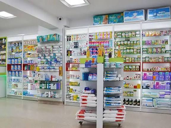Real pharmacy interior with organized shelves and health products